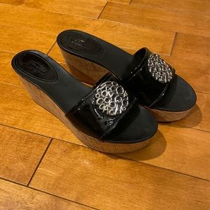 Coach Black Patton Leather Wedge w/ Silver Medallion Embellishment - Size 8